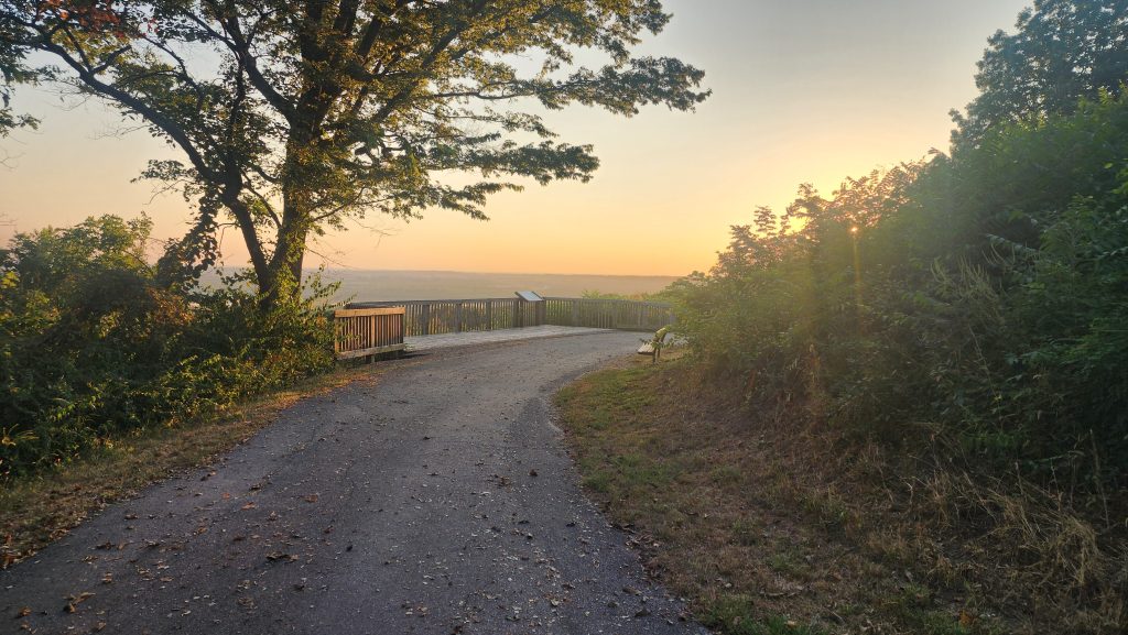 Path to a wooden overlook at sunset — a place to reflect on three years sober.